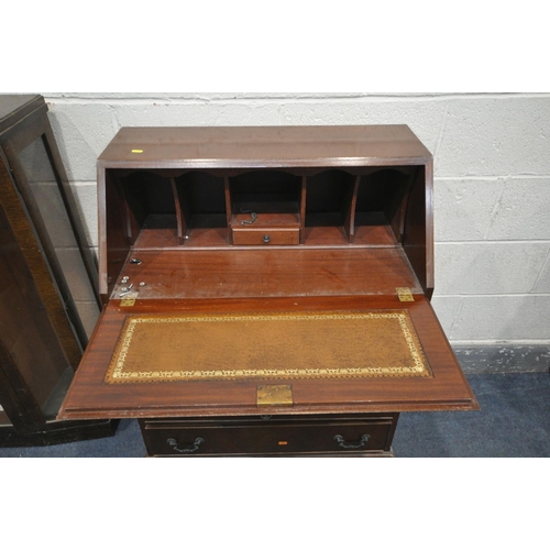 1247 - A MAHOGANY BUREAU, with three drawers, width, along with an oak side by side bureau bookcase, 91cm x... 