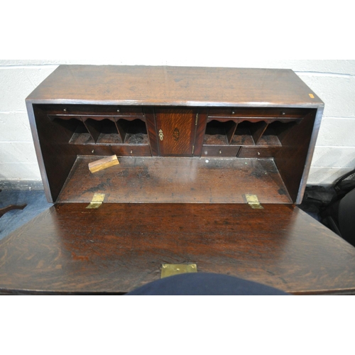 1248 - A GEORGIAN OAK AND MAHOGANY CROSS BANDED FALL FRONT BUREAU, with fitted interior, above three gradua... 