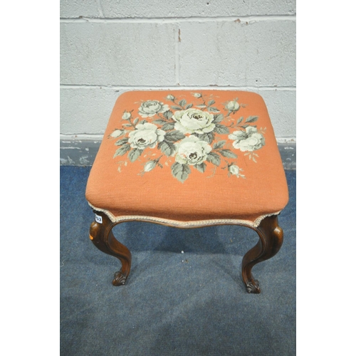 1253 - A VICTORIAN WALNUT STOOL, with a pink floral needlework fabric, on cabriole legs, 46cm x height 47cm