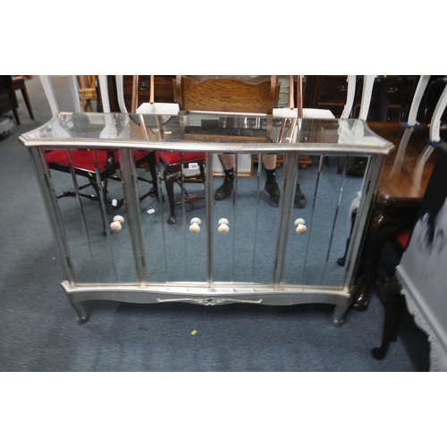 1265 - A SILVER PAINTED AND MIRRORED FOUR DOOR SIDEBOARD, width 136cm x depth 40cm x height 93cm, along wit... 