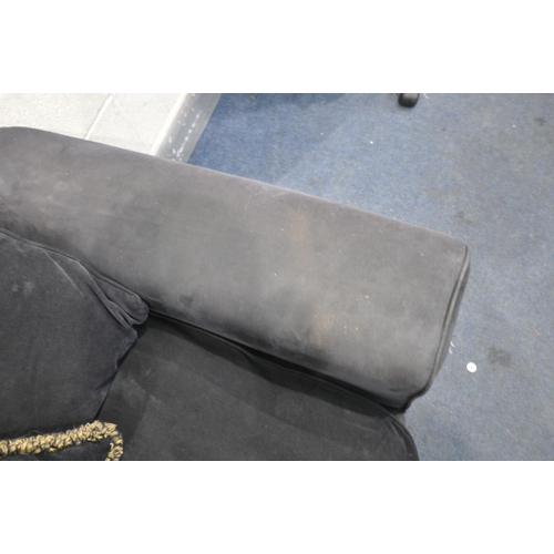 1304 - A BLACK UPHOLSTERED SOFA, length 253cm x depth 90cm x height 70cm (condition:-in need of cleaning)