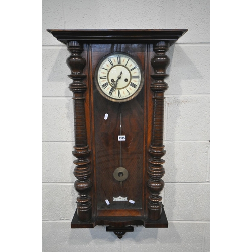 1315 - A LATE 19TH CENTURY WALNUT VIENNA WALL CLOCK, the 7 inch enamel dial with roman numerals, height 101... 