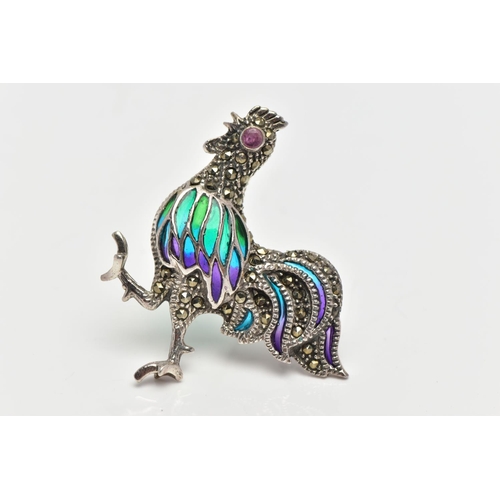 14 - A WHITE METAL, PLIQUE A JOUR COCKEREL BROOCH, marcasite set body, with a circular cut ruby eye, deta... 