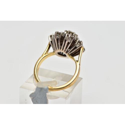 2 - AN 18CT GOLD DIAMOND CLUSTER RING, the brilliant cut central diamond measuring approximately 4.8mm, ... 