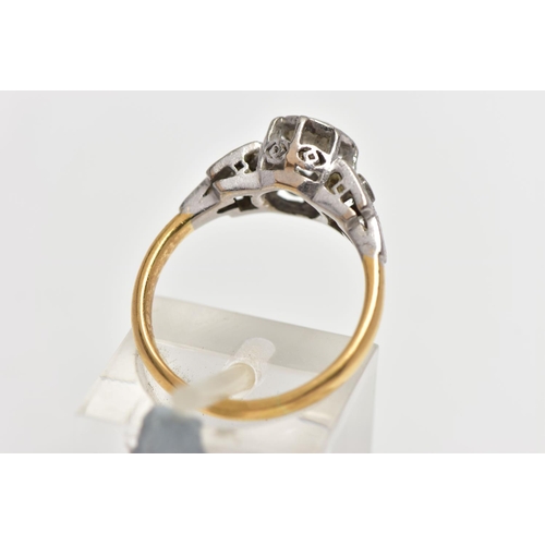 22 - A MID 20TH CENTURY DIAMOND SINGLE STONE RING, set with a round brilliant cut diamond, within an illu... 