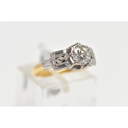 22 - A MID 20TH CENTURY DIAMOND SINGLE STONE RING, set with a round brilliant cut diamond, within an illu... 