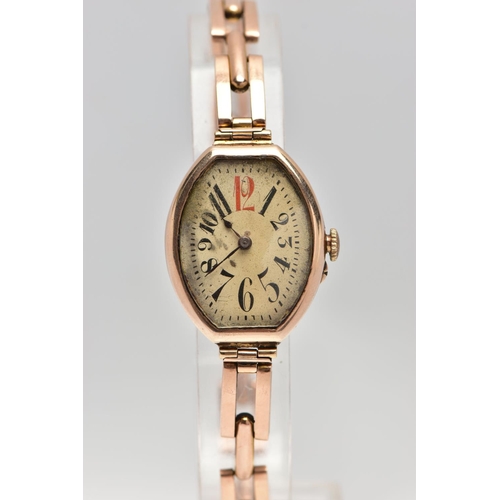 24 - AN EARLY 20TH CENTURY 9CT ROSE GOLD MANUAL WIND WRISTWATCH, the cream dial with black and red Arabic... 