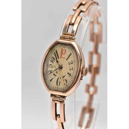 24 - AN EARLY 20TH CENTURY 9CT ROSE GOLD MANUAL WIND WRISTWATCH, the cream dial with black and red Arabic... 