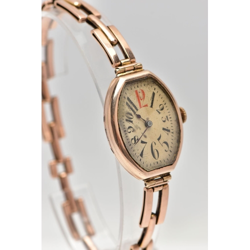 24 - AN EARLY 20TH CENTURY 9CT ROSE GOLD MANUAL WIND WRISTWATCH, the cream dial with black and red Arabic... 