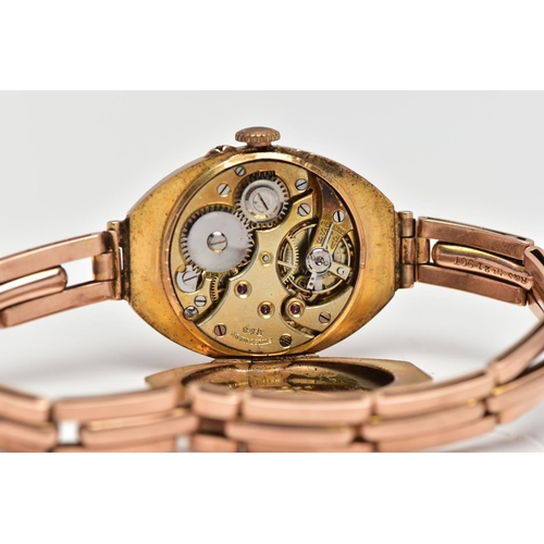 24 - AN EARLY 20TH CENTURY 9CT ROSE GOLD MANUAL WIND WRISTWATCH, the cream dial with black and red Arabic... 