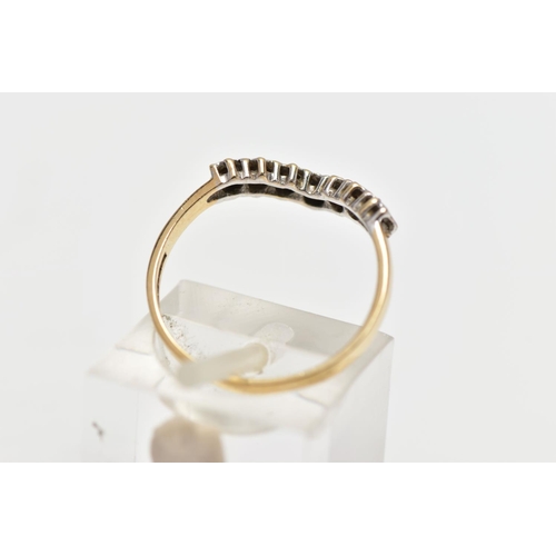 29 - A 9CT GOLD DIAMOND WISHBONE RING, designed as a series of illusion set diamonds, one diamond missing... 