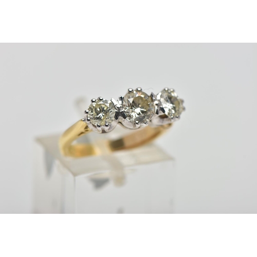 3 - AN 18CT GOLD DIAMOND THREE STONE RING, comprising three graduated brilliant cut diamonds, estimated ... 