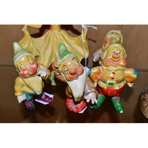 307 - WADE CELLULOSE SNOW WHITE AND THE SEVEN DWARFS FIGURES, designed by Jessie Van Hallen in 1938, talle... 