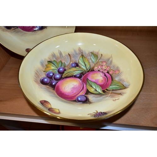 323 - TWO AYNSLEY ORCHARD GOLD PEDESTAL BOWLS, with printed fruit on a cream ground, the central image of ... 