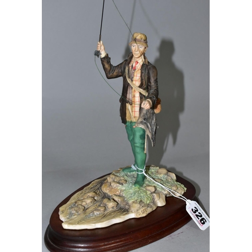 326 - A BORDER FINE ARTS FLY FISHERMAN, model number 110, sculptor David Geenty, supported on a wooden pli... 