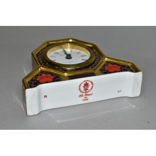 349 - A ROYAL CROWN DERBY OLD IMARI 1128 SOLID GOLD DESK CLOCK, the quartz movement contained in an octago... 