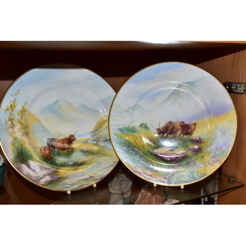 359 - A PAIR OF PLATES HAND PAINTED WITH SCENES OF HIGHLAND CATTLE, in naturalistic Highland setting, sign... 