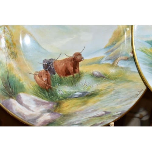 359 - A PAIR OF PLATES HAND PAINTED WITH SCENES OF HIGHLAND CATTLE, in naturalistic Highland setting, sign... 