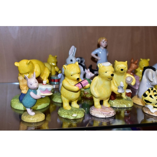 373 - TWENTY ONE ROYAL DOULTON WINNIE THE POOH FIGURES, comprising Winnie the Pooh and the Honeypot WP1, P... 