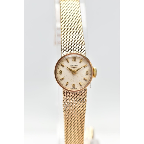 38 - A LADIES MID 20TH CENTURY 9CT GOLD LONGINES WRISTWATCH, the circular white dial, with Arabic quarter... 