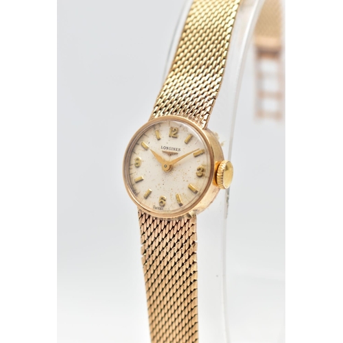 38 - A LADIES MID 20TH CENTURY 9CT GOLD LONGINES WRISTWATCH, the circular white dial, with Arabic quarter... 