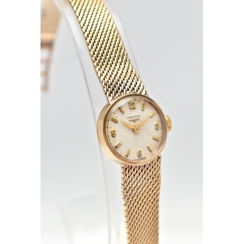 38 - A LADIES MID 20TH CENTURY 9CT GOLD LONGINES WRISTWATCH, the circular white dial, with Arabic quarter... 