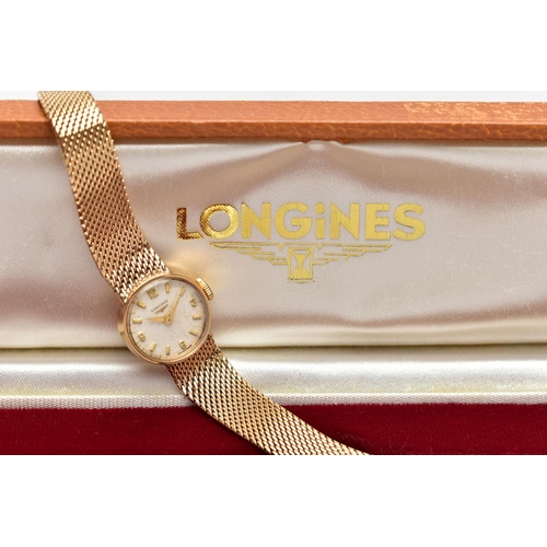 38 - A LADIES MID 20TH CENTURY 9CT GOLD LONGINES WRISTWATCH, the circular white dial, with Arabic quarter... 