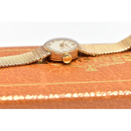 38 - A LADIES MID 20TH CENTURY 9CT GOLD LONGINES WRISTWATCH, the circular white dial, with Arabic quarter... 