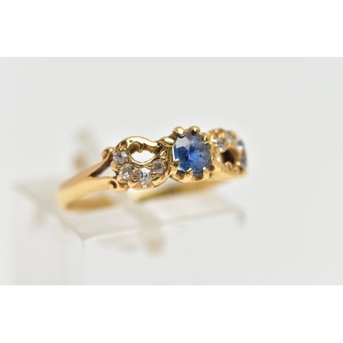 39 - A LATE VICTORIAN 18CT GOLD SAPPHIRE AND DIAMOND DRESS RING, the oval cut sapphire claw set, with old... 