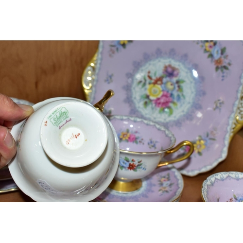 390 - A THIRTY FIVE PIECE SHELLEY CROCHET PATTERN PART TEA SET, with lilac ground and gilt handles, patter... 