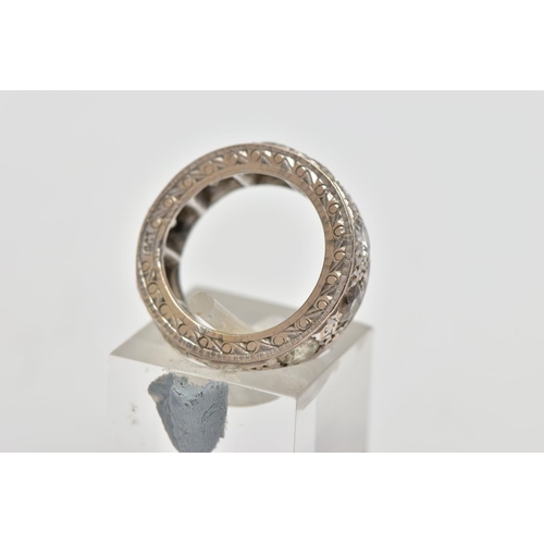 4 - A WHITE METAL DIAMOND FULL ETERNITY RING, comprising a series of brilliant cut diamonds with texture... 