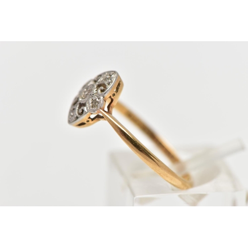 42 - A YELLOW AND WHITE METAL DIAMOND DRESS RING, of openwork design the old and rose cut diamond panel w... 