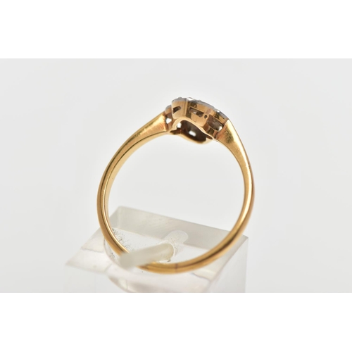 42 - A YELLOW AND WHITE METAL DIAMOND DRESS RING, of openwork design the old and rose cut diamond panel w... 