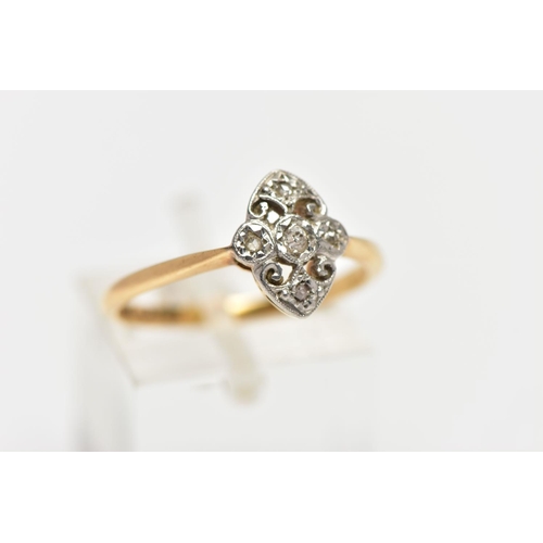 42 - A YELLOW AND WHITE METAL DIAMOND DRESS RING, of openwork design the old and rose cut diamond panel w... 