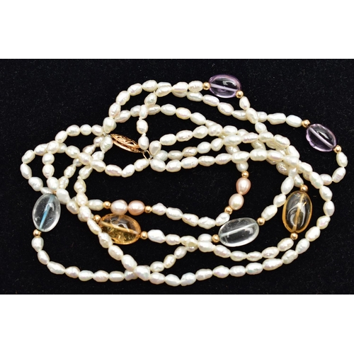 44 - A CULTURED PEARL AND QUARTZ BEAD BRACELET, comprised as a multi strand of cultured pearls, with oval... 