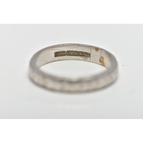 50 - A WHITE METAL BAND RING, decorated with a slightly worn floral pattern, stamped 'HA Platinum', ring ... 