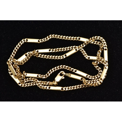 59 - A YELLOW GOLD NECKLACE, designed as a fancy link chain, with plain polished links interspaced by fla... 