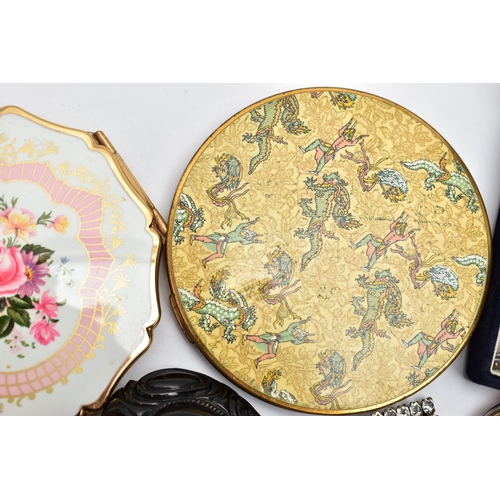 66 - A SELECTION OF COSTUME JEWELLERY AND COMPACTS, to include a Victorian jet mourning brooch, a white m... 