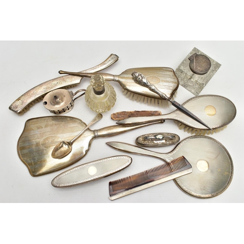 69 - AN ASSORTMENT OF SILVER AND WHITE METAL, to include a silver vanity set, including two brushes a mir... 