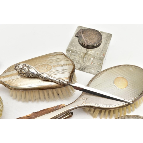 69 - AN ASSORTMENT OF SILVER AND WHITE METAL, to include a silver vanity set, including two brushes a mir... 