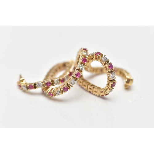 7 - A 9CT YELLOW GOLD DIAMOND AND RUBY LINE BRACELET, set with approximately thirty one round brilliant ... 