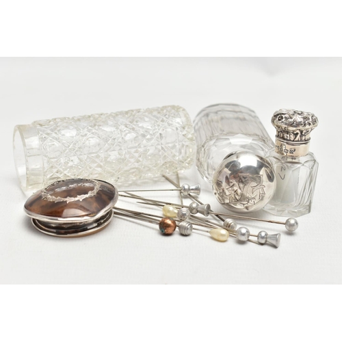 71 - A SELECTION OF GLASS BOTTLES WITH SILVER LIDS AND STICK PINS, to include an early 20th century textu... 