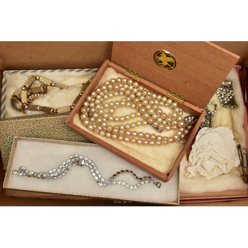 77 - A SELECTION OF COSTUME JEWELLERY, to include an early 20th century locket, stamped '9ct front & back... 