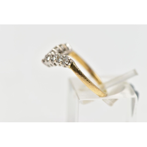 8 - A 9CT GOLD DIAMOND NINE STONE WISH BONE RING, set with a series of nine uniform round brilliant cut ... 