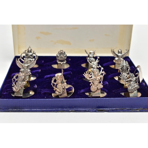 98 - A CASED SET OF MID 20TH CENTURY WHITE METAL PLACE CARD HOLDERS, to include a collection of twelve pl... 