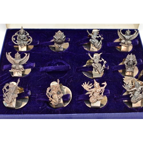 98 - A CASED SET OF MID 20TH CENTURY WHITE METAL PLACE CARD HOLDERS, to include a collection of twelve pl... 