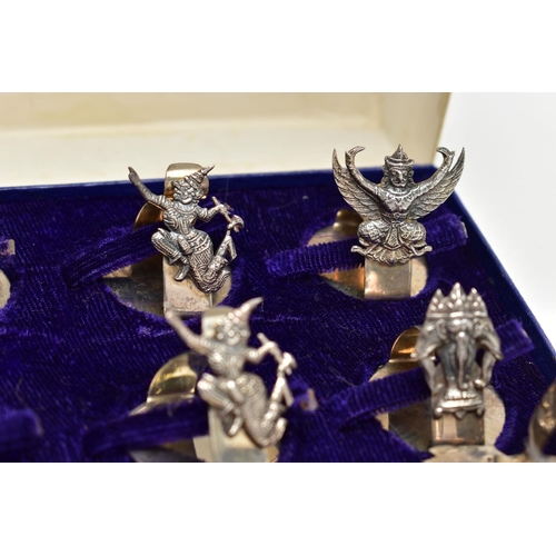 98 - A CASED SET OF MID 20TH CENTURY WHITE METAL PLACE CARD HOLDERS, to include a collection of twelve pl... 