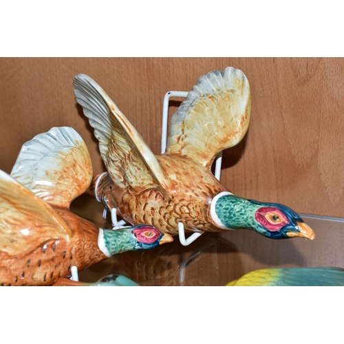 402 - TWO BESWICK FLYING PHEASANTS AND THREE UNMARKED FLYING DUCKS, comprising Beswick 661/2 and 661/3 phe... 