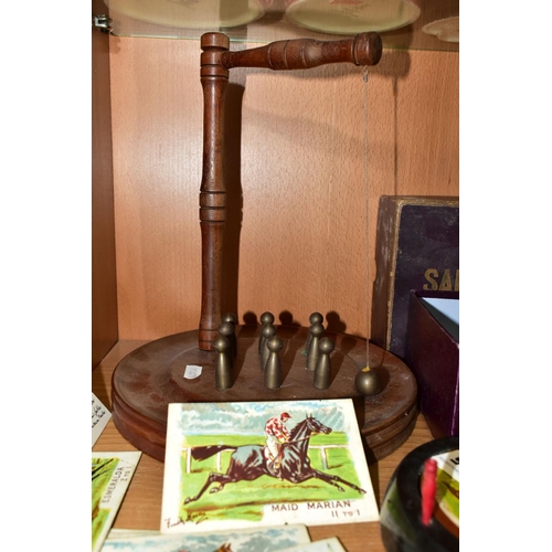 405 - A GROUP OF GAMES, A TEA CADDY AND A BAROMETER, comprising a boxed Sandown horse racing game by F H A... 