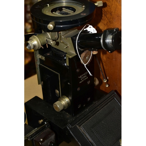 406 - AN EARLY REICHENERT 107346 AUSTRIA PHOTOGRAPHIC MICROSCOPE, in original wooden case with key, light ... 